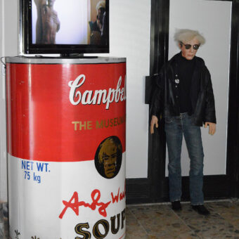 Andy Warhol with his Campbell's Soup Can Sculpture